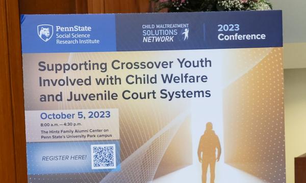 Photo of the poster for the Wide shot of the attendees of the Child Maltreatment Solutions Network Conference.