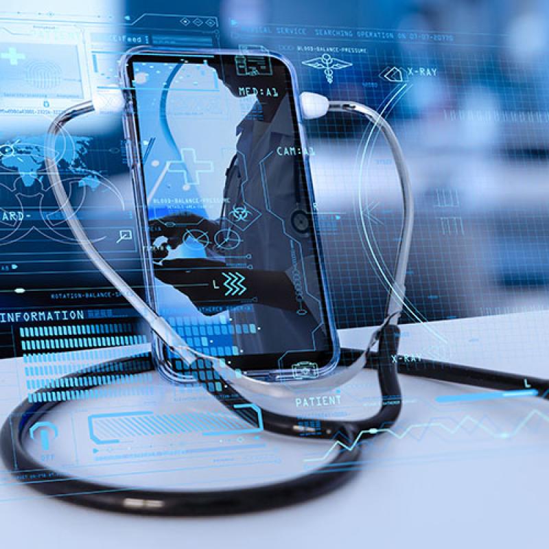Telemedicine concept represented with a smartphone connected to a stethoscope.