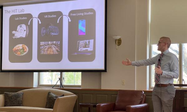 Travis Masterson presenting his Powerpoint presentation.