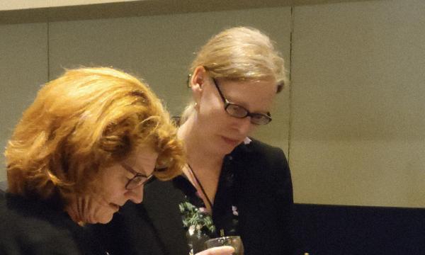 Attendees from the IFSE Workshop enjoy a reception.