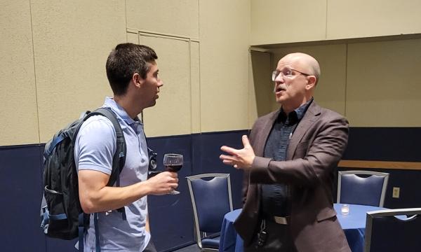 Attendees from the IFSE Workshop enjoy a reception.