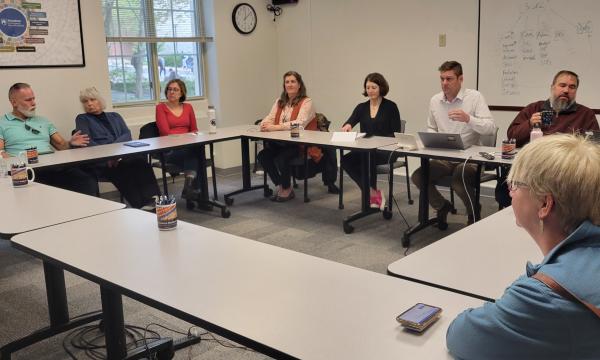 Attendees listen to a presentation about SSRI's Data Resources Hub. 