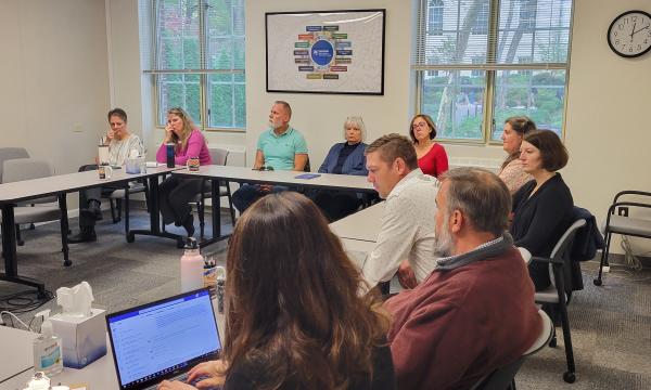 Attendees listen to a presentation about SSRI's Data Resources Hub. 