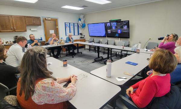 Attendees listen to a presentation about SSRI's Data Resources Hub. 