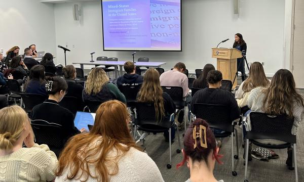Group of students and faculty attend the 31st Annual Family Symposium.