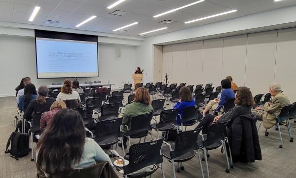 Group of students and faculty attend the Tuesday portion of the 31st Annual Family Symposium.
