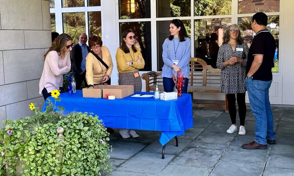 SSRI staff greeting attendees.