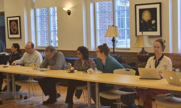 Attendees gather in the 110 Henderson Building Living Center.