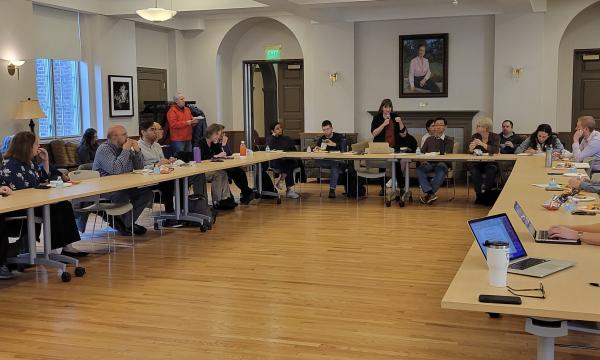 Attendees gather in the 110 Henderson Building Living Center.