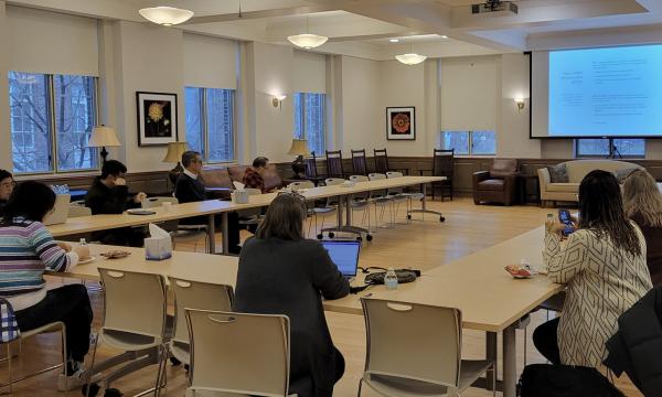 The attendees of the SSRI Open House enjoy a lively discussion about NIH-funded centers in the Henderson Living Center.