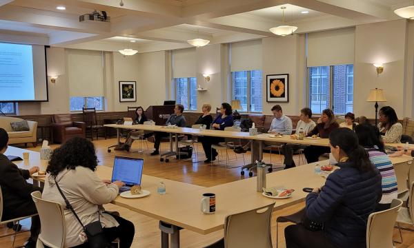 The attendees of the SSRI Open House enjoy a lively discussion about NIH-funded centers in the Henderson Living Center.