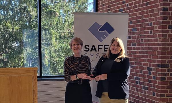 Lisa Davis and Cynthia Bittner pose with the award.