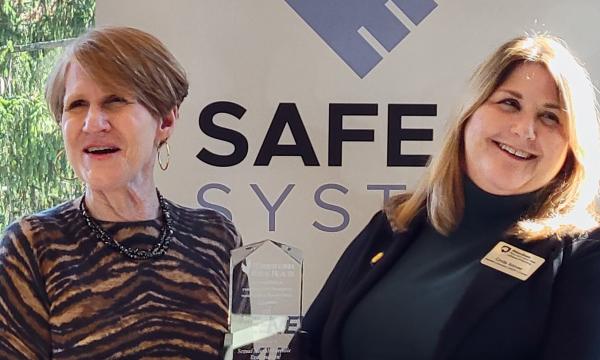 Lisa Davis and Cynthia Bittner pose with the award.