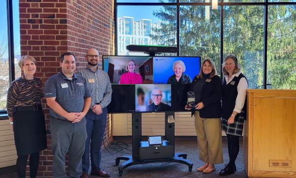 The SAFE-T System team poses with their award.