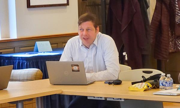 Jason Shumberger presents to the group about using restricted data.