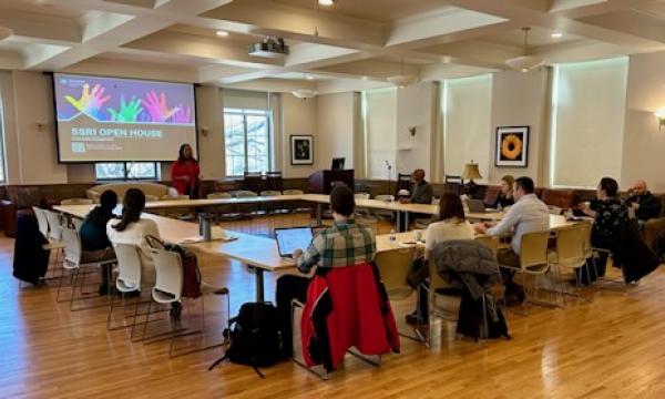 Attendees of the SSRI Open House on Community Engagement listening to Amy Snipes's presentation.