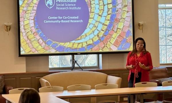 Amy Snipes, SSRI associate director, presenting about community engagement. 