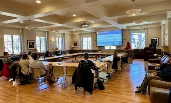 Attendees of the SSRI Open House on Community Engagement listening to Amy Snipes's presentation.