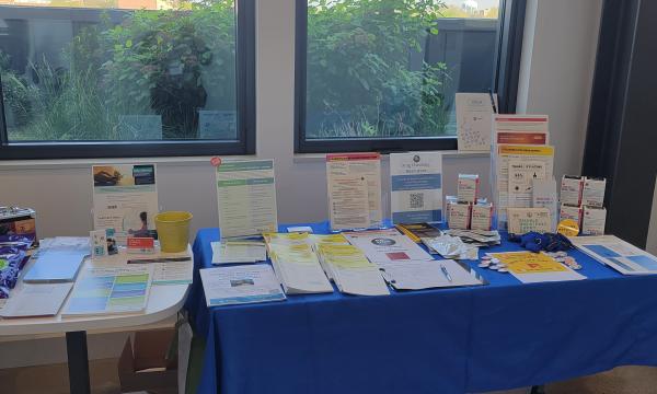 Materials from Penn State's Addiction Center for Translation laid out on a table.