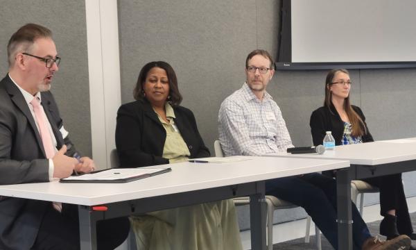 Four panelists engage in a discussion about tobacco at the CSUA conference.