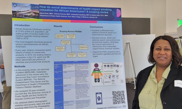 Sophia Allen stands next to her poster.