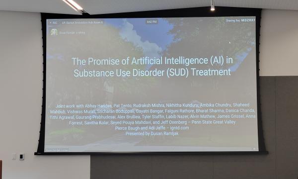 Dusan Ramijak presents remotely about the promise of AI in substance use disorder and treatment.