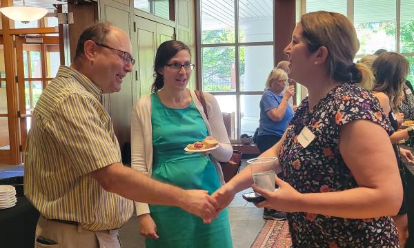 Attendees of the annual SSRI Spring Celebration gather in the Hintz Alumni Center.