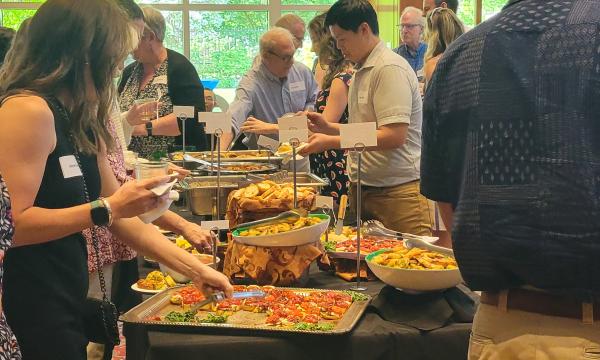 Attendees of the annual SSRI Spring Celebration gather in the Hintz Alumni Center.