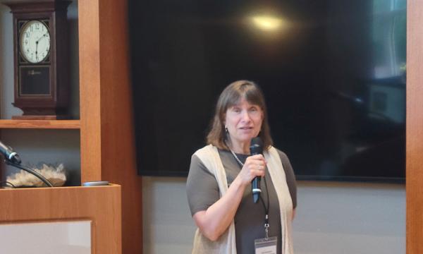 Deborah Ehrenthal, SSRI Director, speaks to the crowd of attendees.
