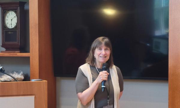 Deborah Ehrenthal, SSRI Director, speaks to the crowd of attendees.