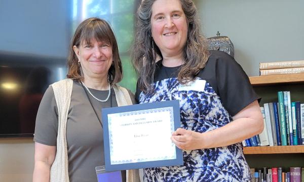 Deborah Ehrenthal, SSRI Director, and Lisa Ryan, Data Compliance Specialist for PRI, with her Diversity and Inclusion Award.