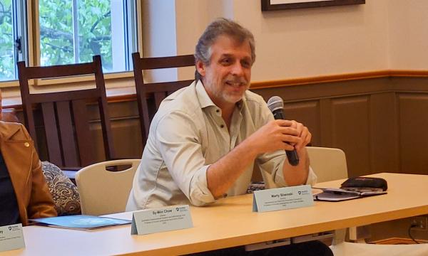 Marty Sliwinski, director of the Geroscience Consortia, addresses the crowd.