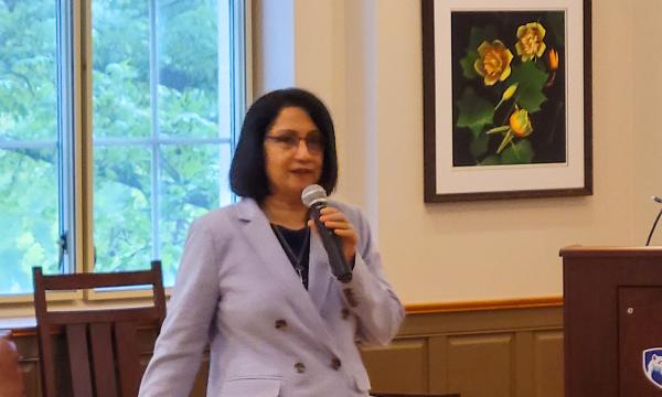 Penn State President Bendapudi talks to the group.