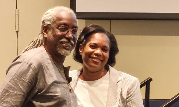 Nicole Webster and Timothy Eatman, keynote speaker and Educational Sociologist, Publicly Engaged Scholar and Inaugural Dean of the Honors Living-Learning Community and Professor of Urban Education at Rutgers University-Newark.