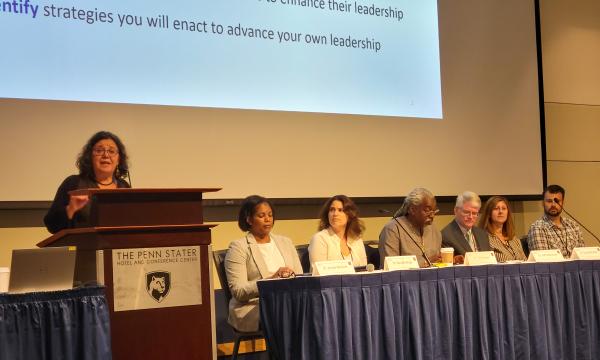 Zoubeida Ounaies holds a panel discussion with researchers.