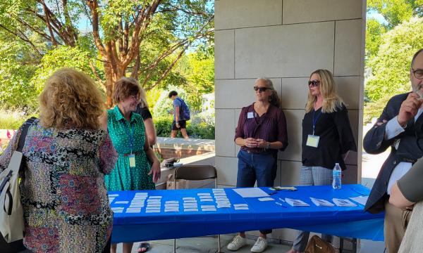 SSRI admin team welcomes attendees.