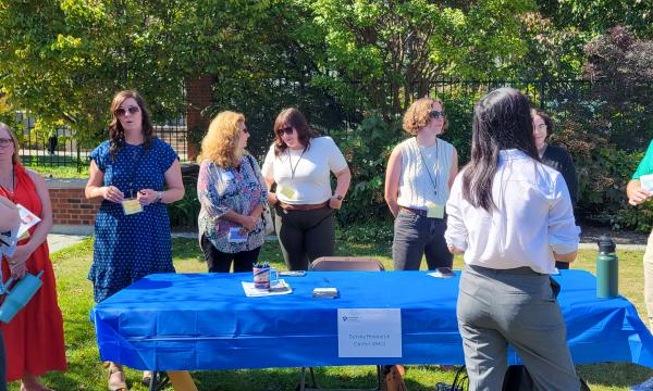 Attendees of the SSRI Fall Welcome event mingling.