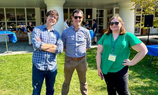 Attendees mingling at on the Alumni Hall lawn.