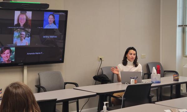 Courtney Karmelita talks to the group about research integrity.