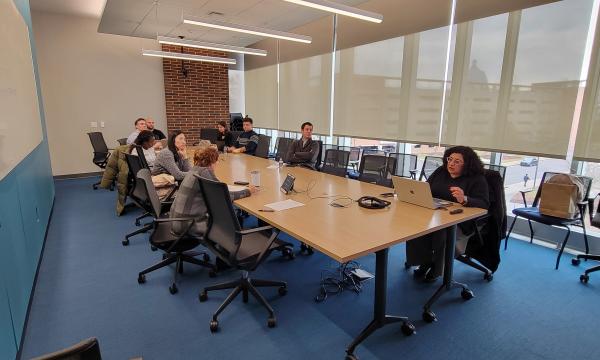 Wideshot of the attendees of the SSRI Open House looking towards the presentation in Room 314.