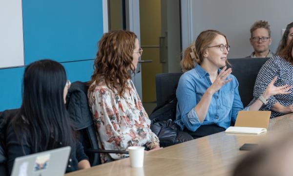 Attendees of the PRI New Associates Orientation engage in a discussion.