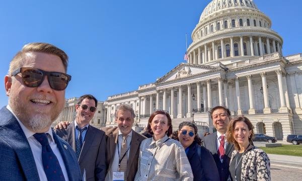 Group shot of Penn State COSSA Day attendees outside the U.S. Capitol.