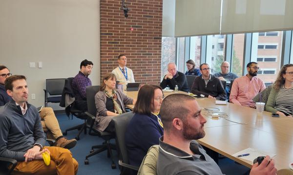 Attendees of the SSRI Open House on April 7 in Room 314.