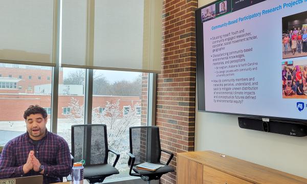 Mark Ortiz, SSRI cofunded faculty member, presents to the group.