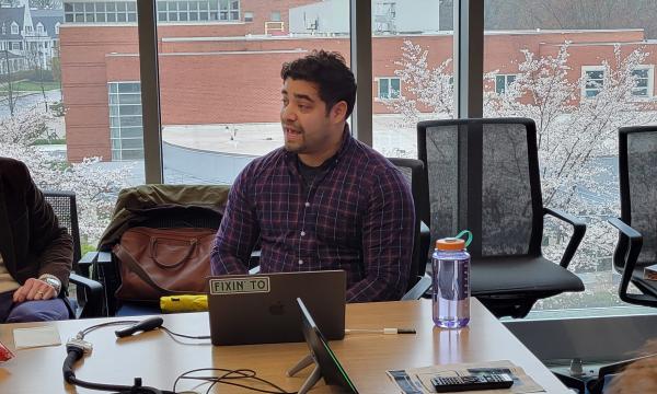 Mark Ortiz, SSRI cofunded faculty member, presents to the group.