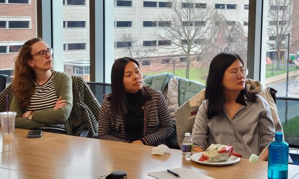 Attendees of the SSRI Open House listen to Kyle Aun's presentation.