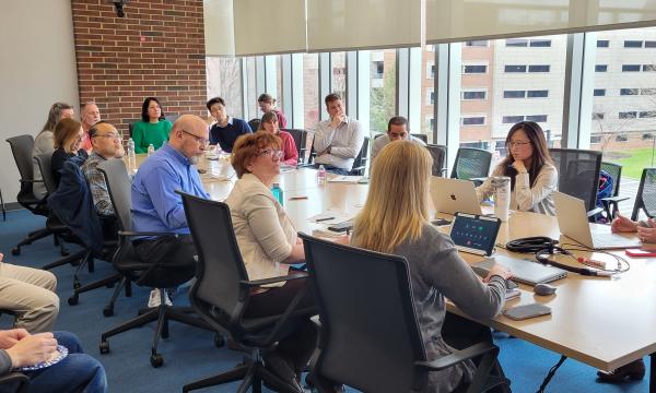 Attendees of the ICDS Open House listen to the presentation in 314 Welch.