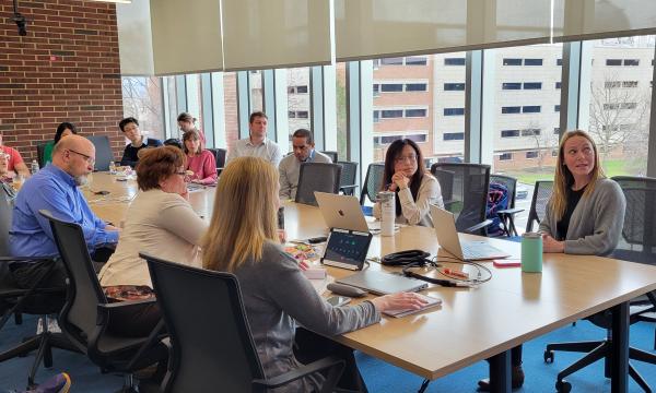 Attendees of the ICDS Open House listen to the presentation in 314 Welch
