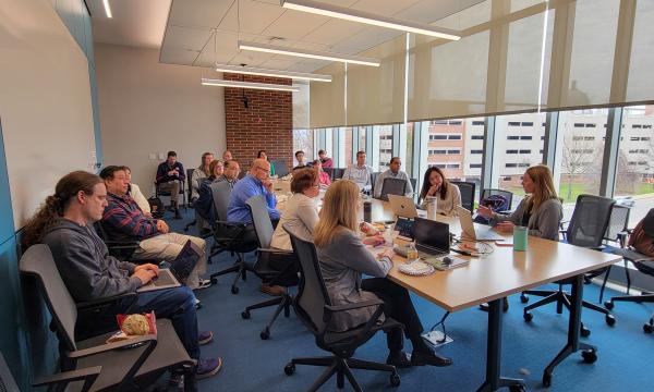 Wide shot of the attendees of the ICDS Open House.