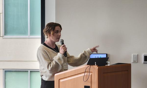 Madison Kelm, PhD, Doctoral Candidate in Psychology, College of the Liberal Arts, presents her talk.
